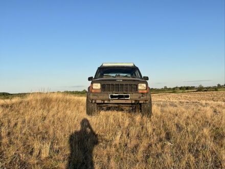 Чорний Джип Cherokee, об'ємом двигуна 2.1 л та пробігом 270 тис. км за 3814 $, фото 1 на Automoto.ua
