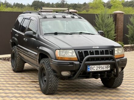 Чорний Джип Cherokee, об'ємом двигуна 0.32 л та пробігом 150 тис. км за 6999 $, фото 1 на Automoto.ua