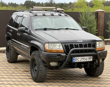 Чорний Джип Cherokee, об'ємом двигуна 0.32 л та пробігом 150 тис. км за 6999 $, фото 1 на Automoto.ua