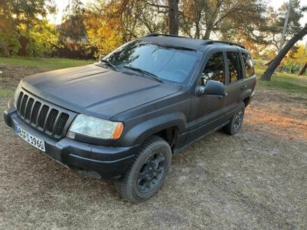 Чорний Джип Cherokee, об'ємом двигуна 4 л та пробігом 225 тис. км за 4200 $, фото 1 на Automoto.ua