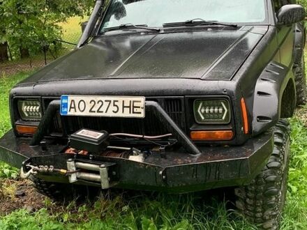 Чорний Джип Cherokee, об'ємом двигуна 2.5 л та пробігом 200 тис. км за 7000 $, фото 1 на Automoto.ua