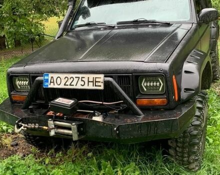 Черный Джип Чероки, объемом двигателя 2.5 л и пробегом 200 тыс. км за 7000 $, фото 1 на Automoto.ua