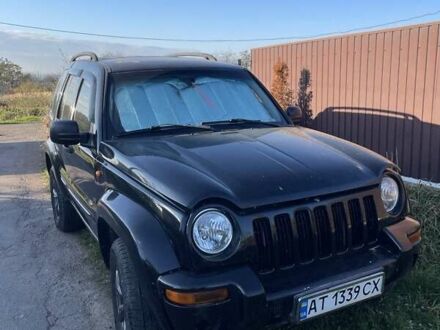 Черный Джип Чероки, объемом двигателя 3.7 л и пробегом 320 тыс. км за 6000 $, фото 1 на Automoto.ua