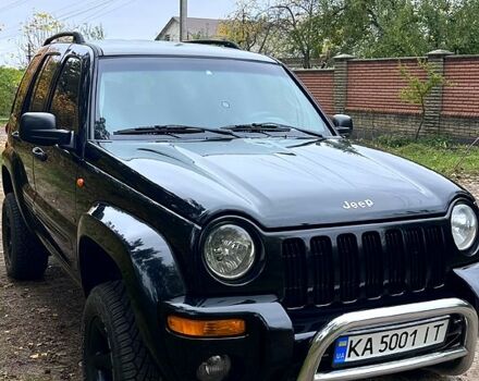 Черный Джип Чероки, объемом двигателя 2.5 л и пробегом 185 тыс. км за 7500 $, фото 1 на Automoto.ua