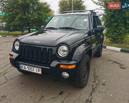 Черный Джип Чероки, объемом двигателя 3.7 л и пробегом 263 тыс. км за 7600 $, фото 1 на Automoto.ua
