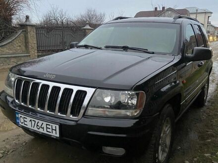 Чорний Джип Cherokee, об'ємом двигуна 4 л та пробігом 258 тис. км за 7000 $, фото 1 на Automoto.ua