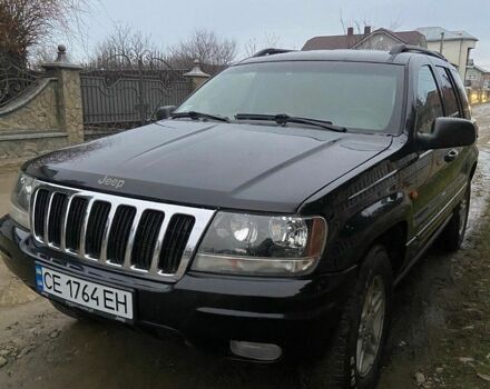 Чорний Джип Cherokee, об'ємом двигуна 4 л та пробігом 258 тис. км за 7000 $, фото 1 на Automoto.ua
