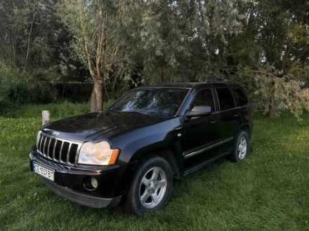 Чорний Джип Cherokee, об'ємом двигуна 3 л та пробігом 300 тис. км за 8904 $, фото 1 на Automoto.ua