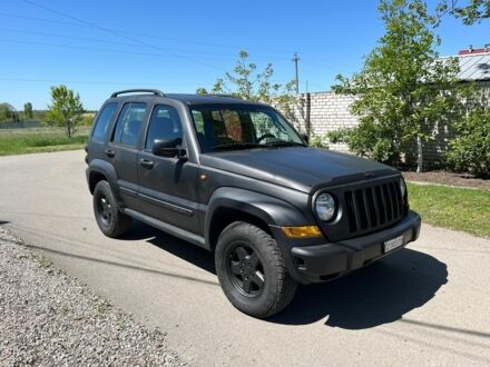 Чорний Джип Cherokee, об'ємом двигуна 0.28 л та пробігом 300 тис. км за 4699 $, фото 1 на Automoto.ua