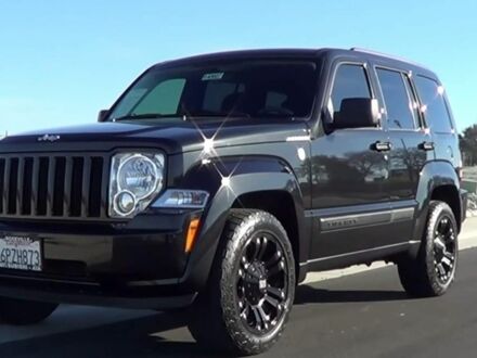 Чорний Джип Cherokee, об'ємом двигуна 3.7 л та пробігом 190 тис. км за 11142 $, фото 1 на Automoto.ua