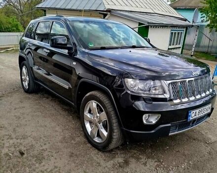 Черный Джип Чероки, объемом двигателя 3 л и пробегом 290 тыс. км за 17000 $, фото 1 на Automoto.ua