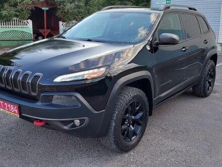 Чорний Джип Cherokee, об'ємом двигуна 2.4 л та пробігом 257 тис. км за 11300 $, фото 1 на Automoto.ua