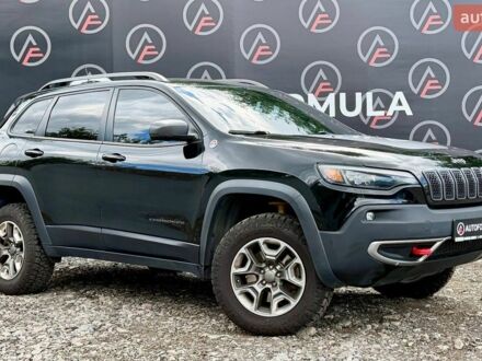 Чорний Джип Cherokee, об'ємом двигуна 3.24 л та пробігом 175 тис. км за 18490 $, фото 1 на Automoto.ua