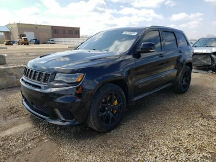 Чорний Джип Cherokee, об'ємом двигуна 6.2 л та пробігом 61 тис. км за 28000 $, фото 1 на Automoto.ua