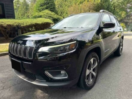 Чорний Джип Cherokee, об'ємом двигуна 3.2 л та пробігом 56 тис. км за 12700 $, фото 1 на Automoto.ua