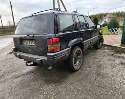 Фиолетовый Джип Чероки, объемом двигателя 2.5 л и пробегом 377 тыс. км за 2500 $, фото 1 на Automoto.ua