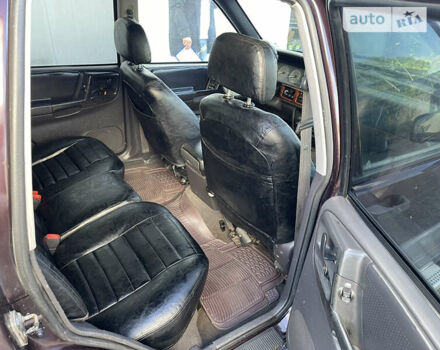 Коричневий Джип Cherokee, об'ємом двигуна 4 л та пробігом 152 тис. км за 5000 $, фото 25 на Automoto.ua