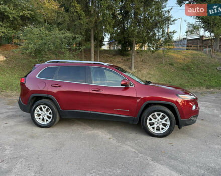 Красный Джип Чероки, объемом двигателя 3.24 л и пробегом 145 тыс. км за 15200 $, фото 1 на Automoto.ua