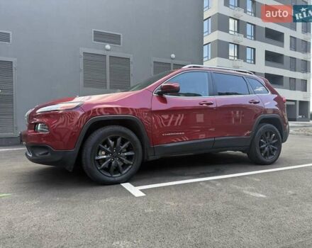 Красный Джип Чероки, объемом двигателя 3.24 л и пробегом 129 тыс. км за 15955 $, фото 1 на Automoto.ua