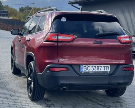 Червоний Джип Cherokee, об'ємом двигуна 2.4 л та пробігом 105 тис. км за 12800 $, фото 3 на Automoto.ua
