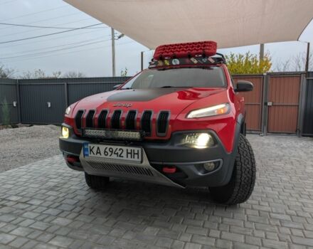 Красный Джип Чероки, объемом двигателя 3.2 л и пробегом 58 тыс. км за 23000 $, фото 1 на Automoto.ua