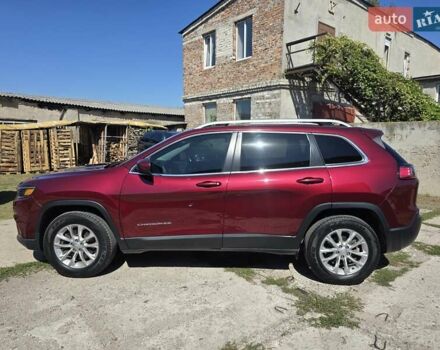 Червоний Джип Cherokee, об'ємом двигуна 2.36 л та пробігом 67 тис. км за 14000 $, фото 3 на Automoto.ua