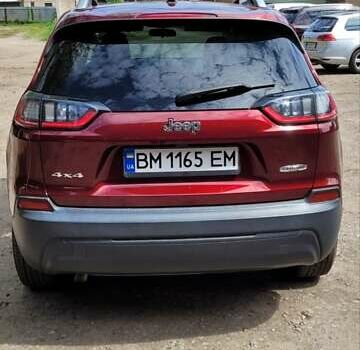 Червоний Джип Cherokee, об'ємом двигуна 2.36 л та пробігом 107 тис. км за 14800 $, фото 3 на Automoto.ua