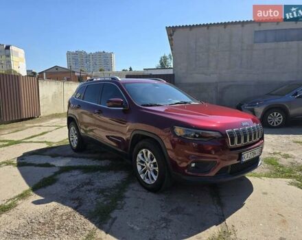 Червоний Джип Cherokee, об'ємом двигуна 2.36 л та пробігом 67 тис. км за 14000 $, фото 2 на Automoto.ua