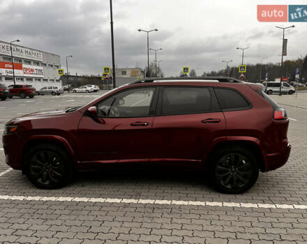 Красный Джип Чероки, объемом двигателя 2 л и пробегом 109 тыс. км за 19500 $, фото 1 на Automoto.ua