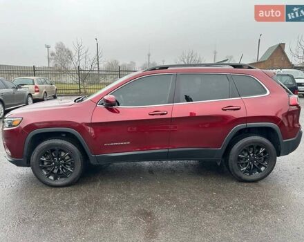 Красный Джип Чероки, объемом двигателя 3.24 л и пробегом 91 тыс. км за 18500 $, фото 2 на Automoto.ua