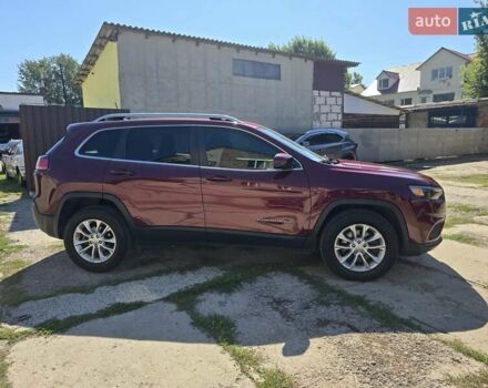 Червоний Джип Cherokee, об'ємом двигуна 2.36 л та пробігом 67 тис. км за 14000 $, фото 4 на Automoto.ua