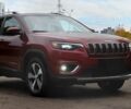 Красный Джип Чероки, объемом двигателя 2 л и пробегом 75 тыс. км за 10098 $, фото 1 на Automoto.ua