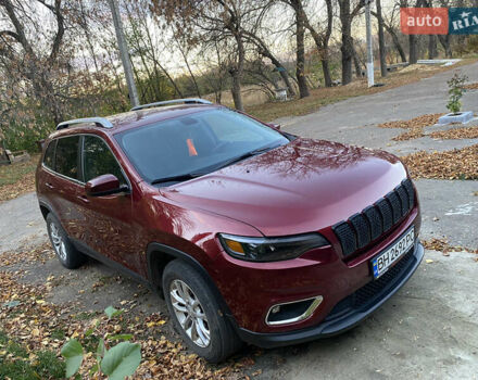 Червоний Джип Cherokee, об'ємом двигуна 2.4 л та пробігом 85 тис. км за 13500 $, фото 4 на Automoto.ua