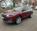 Красный Джип Чероки, объемом двигателя 2.4 л и пробегом 187 тыс. км за 14700 $, фото 1 на Automoto.ua