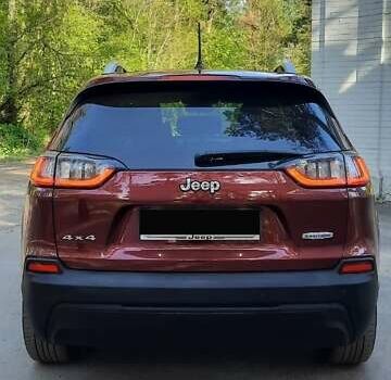 Червоний Джип Cherokee, об'ємом двигуна 2.36 л та пробігом 65 тис. км за 17500 $, фото 2 на Automoto.ua