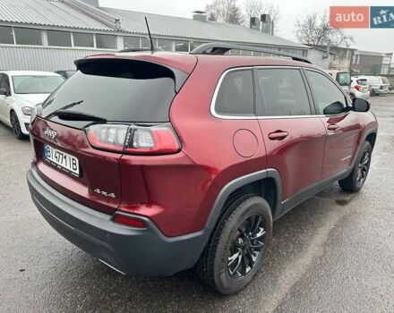 Красный Джип Чероки, объемом двигателя 3.24 л и пробегом 91 тыс. км за 18500 $, фото 6 на Automoto.ua