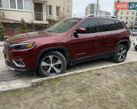 Красный Джип Чероки, объемом двигателя 2.36 л и пробегом 73 тыс. км за 15900 $, фото 1 на Automoto.ua