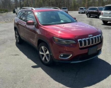 Красный Джип Чероки, объемом двигателя 3.2 л и пробегом 47 тыс. км за 17000 $, фото 2 на Automoto.ua