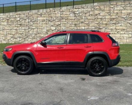 Червоний Джип Cherokee, об'ємом двигуна 3.2 л та пробігом 88 тис. км за 12000 $, фото 2 на Automoto.ua