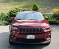 Червоний Джип Cherokee, об'ємом двигуна 2 л та пробігом 57 тис. км за 17700 $, фото 2 на Automoto.ua