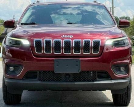 Красный Джип Чероки, объемом двигателя 3.2 л и пробегом 68 тыс. км за 12000 $, фото 1 на Automoto.ua