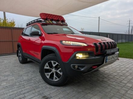 Красный Джип Чероки, объемом двигателя 3.2 л и пробегом 58 тыс. км за 23000 $, фото 1 на Automoto.ua