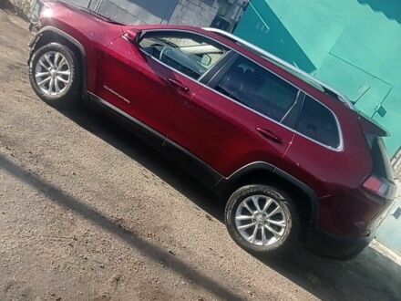 Красный Джип Чероки, объемом двигателя 2.4 л и пробегом 133 тыс. км за 12600 $, фото 1 на Automoto.ua