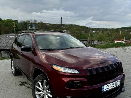 Червоний Джип Cherokee, об'ємом двигуна 2.4 л та пробігом 76 тис. км за 14100 $, фото 1 на Automoto.ua