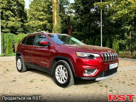 Красный Джип Чероки, объемом двигателя 2.4 л и пробегом 210 тыс. км за 14500 $, фото 1 на Automoto.ua