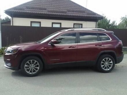 Красный Джип Чероки, объемом двигателя 2.4 л и пробегом 163 тыс. км за 14500 $, фото 1 на Automoto.ua