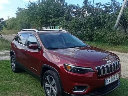 Красный Джип Чероки, объемом двигателя 3.24 л и пробегом 58 тыс. км за 20000 $, фото 1 на Automoto.ua