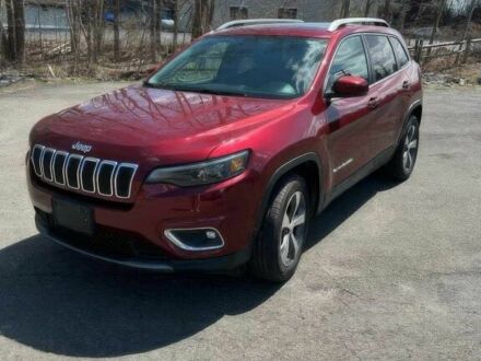 Красный Джип Чероки, объемом двигателя 3.2 л и пробегом 47 тыс. км за 17000 $, фото 1 на Automoto.ua