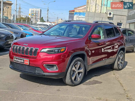 Червоний Джип Cherokee, об'ємом двигуна 3.2 л та пробігом 58 тис. км за 19990 $, фото 1 на Automoto.ua