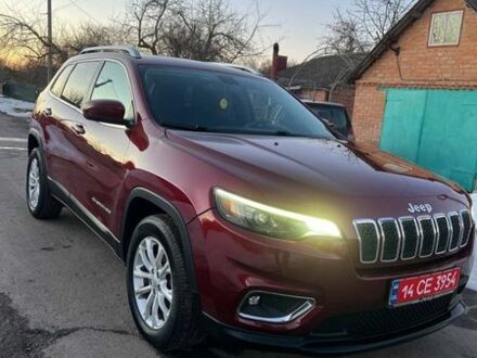 Красный Джип Чероки, объемом двигателя 2.4 л и пробегом 148 тыс. км за 13300 $, фото 1 на Automoto.ua
